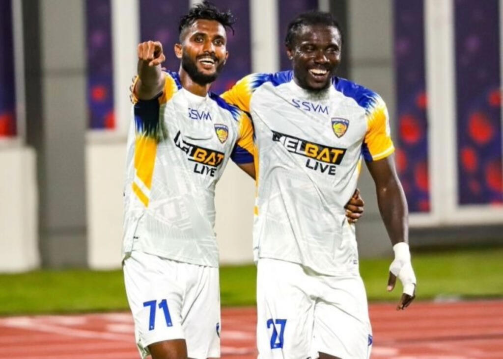 Chennaiyin FC's Farukh Choudhary and Daniel Chima Chukwu celebrate a goal during the ISL 2024-25 match against Odisha FC at Kalinga Stadium, Bhubaneswar.