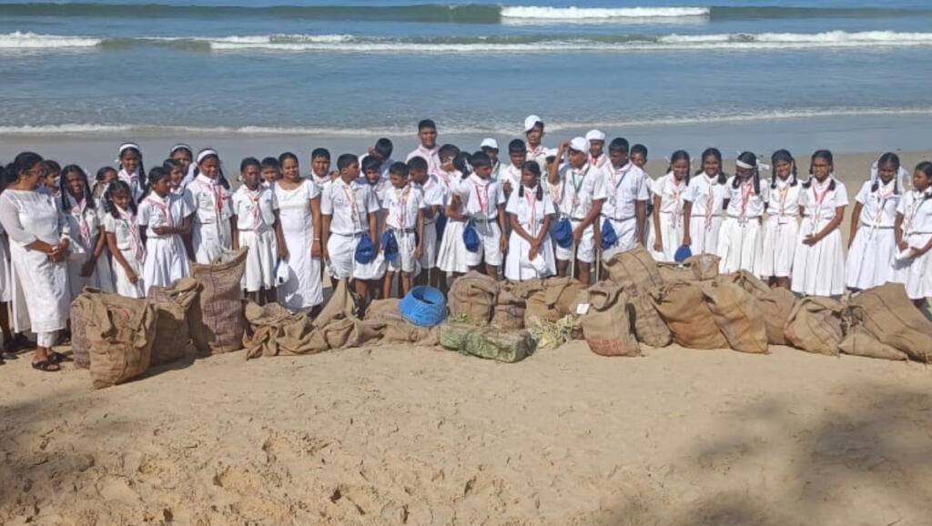 Volunteers after a hard beach clean-up at Betalbatim.
