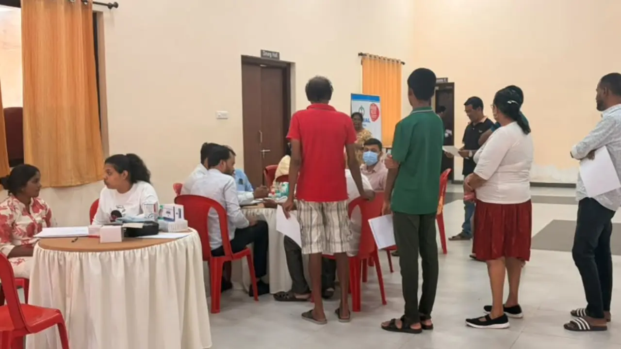 Doctors consult residents during the free Healthy Heart medical camp at the Village Panchayat Multipurpose Hall in Nagoa, Salcete, Goa, where blood pressure, blood sugar and ECG screenings were conducted.