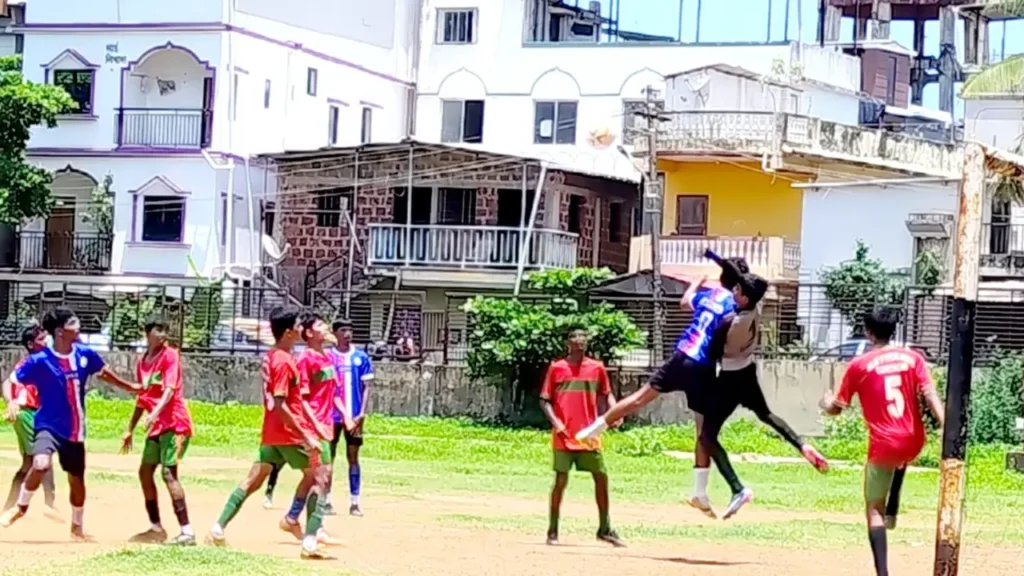 Players from Our Lady of Perpetual Succour High School and St. Andrew's Higher Secondary School challenge for the ball during the Mormugao Cluster 11 Subroto Mukherjee Under-17 football tournament.