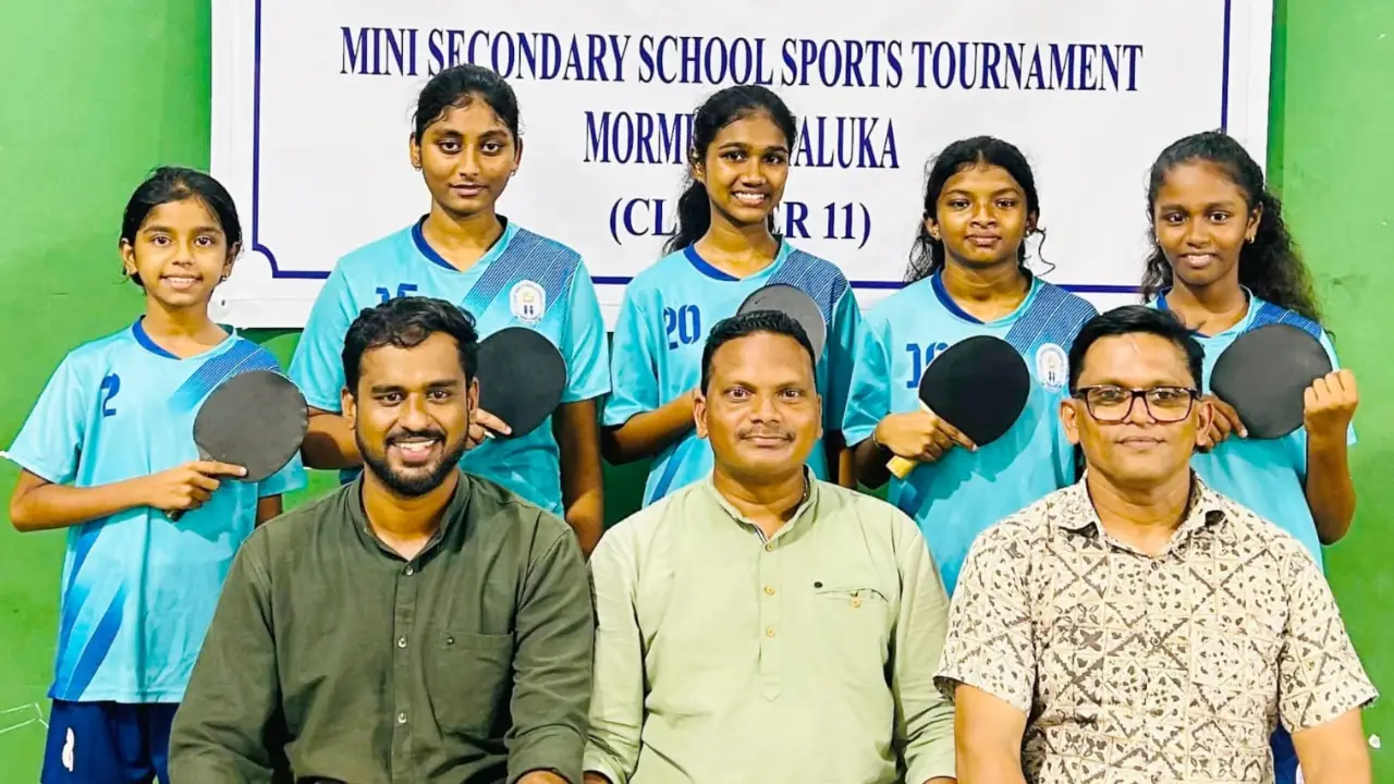 Players of St. Ann's High School, Quessim, with officials after winning the Mormugao Taluka Cluster 11 Level U-14 Girls Table Tennis Tournament 2026–27 at Chicalim Sports Complex.