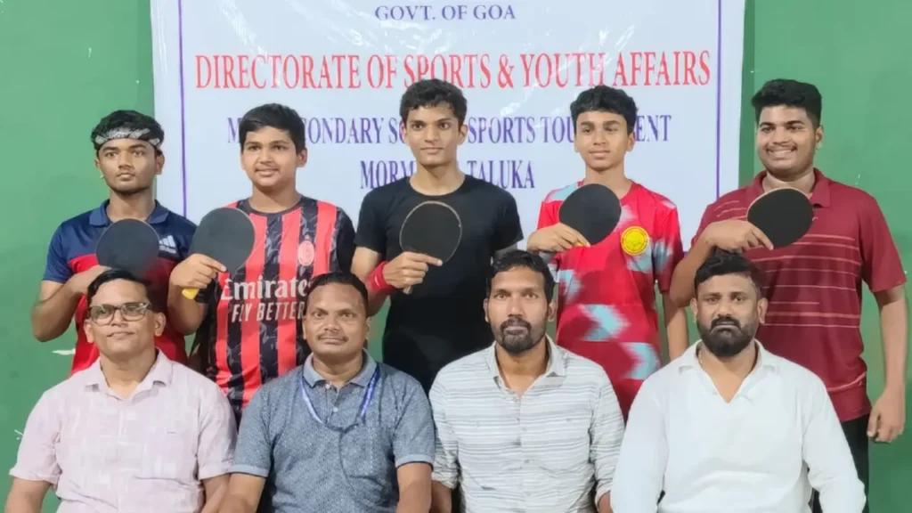 Regina Mundi High School boys' team and officials after winning the Mormugao Cluster 11 U-17 Boys Table Tennis Tournament at Chicalim Sports Complex, qualifying for the 2026-27 Goa state-level championship.