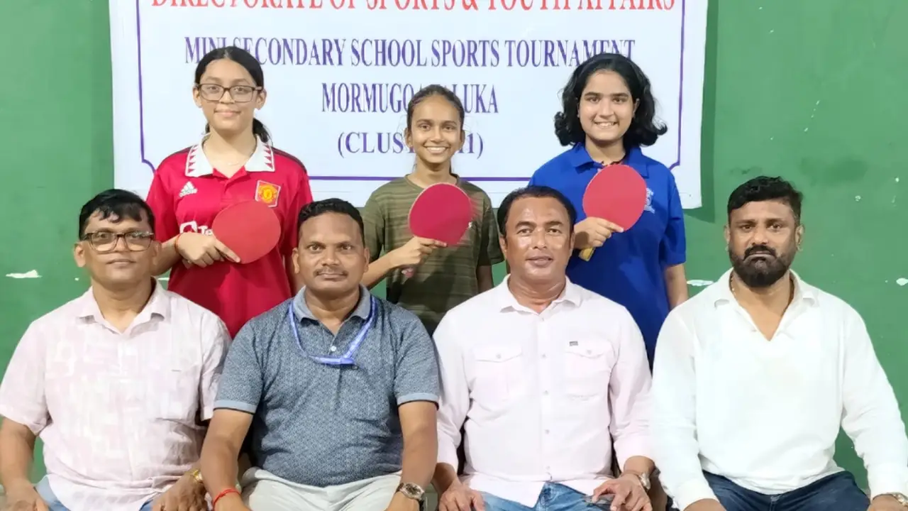 St. Joseph Institute girls' team and officials after winning the Mormugao Cluster 11 U-17 Girls Table Tennis Tournament at Chicalim Sports Complex, securing qualification for the 2026-27 Goa state-level championship.
