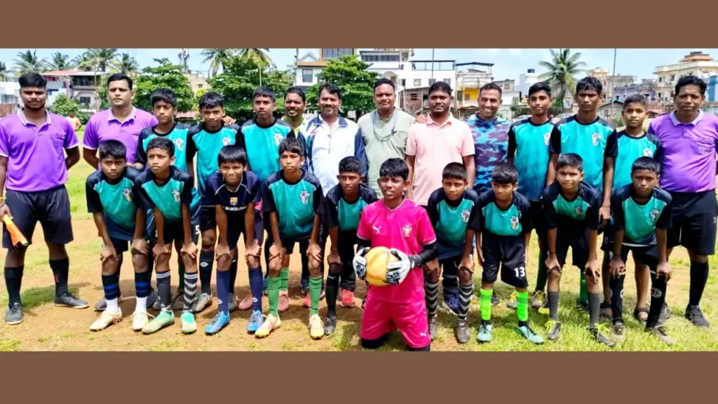 St. Thomas High School, Cansaulim Under-15 football team with coaches and officials after winning the Mormugao Cluster 11 Subroto Mukherjee Football Tournament 2026-27 at Rose Circle Ground, Sada.