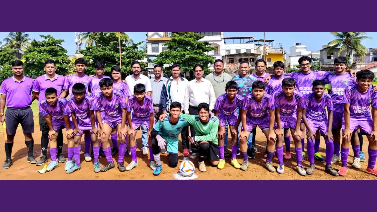 Regina Mundi High School Under-17 football team with coaches and officials after winning the Mormugao Taluka Cluster 11 Subroto Mukherjee Football Tournament in Vasco, Goa.