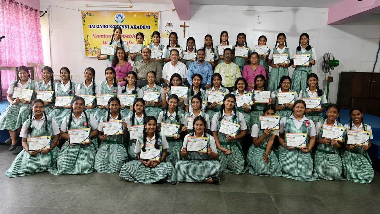 Students holding participation certificates with organisers and teachers after the Dalgado Konknni Akademi poem-writing workshop at Our Lady of the Rosary High School in Dona Paula, Goa.