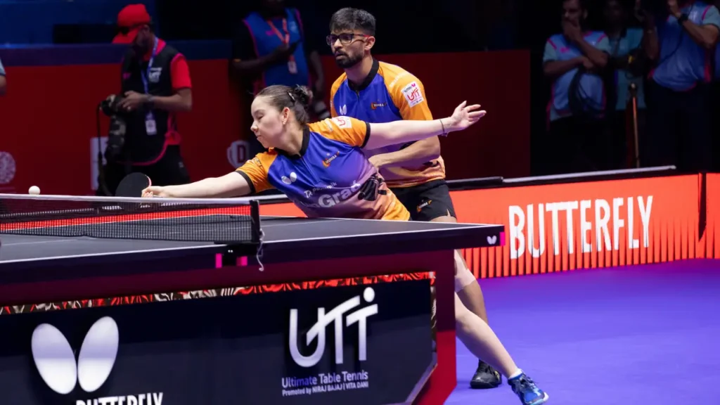 Manush Shah and Anna Hursey of U Mumba TT play a mixed doubles point against PBG Pune Jaguars during a UTT Season 7 match.