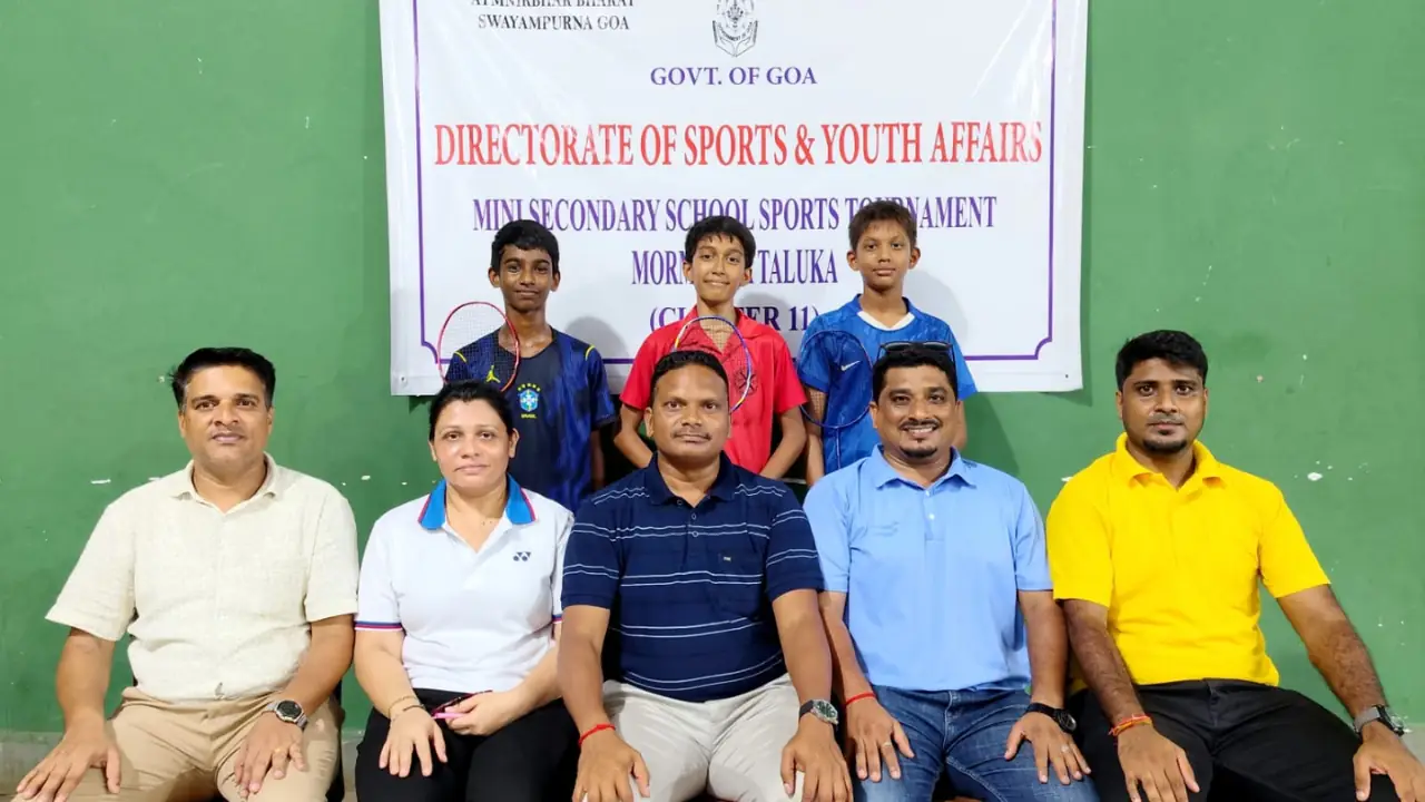 Murgaon High School players and tournament officials pose after the school won the Mormugao Taluka Cluster 11 Under-17 Boys Badminton Tournament at the Indoor Hall, Chicalim Sports Complex, Goa.