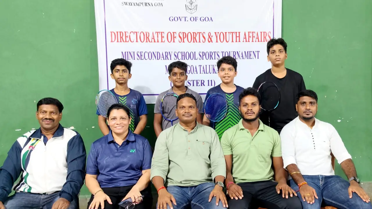 Mt. Litera Zee School's Under-14 boys badminton team with officials after winning the Mormugao Taluka Cluster 11 tournament at Chicalim Sports Complex, Goa.