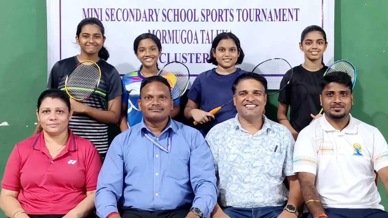 Vidya Mandir School players and officials pose for a photograph after the team won the Mormugao Taluka Cluster 11 Under-14 Girls Badminton Tournament at the Chicalim Sports Complex, qualifying for the state-level tournament.